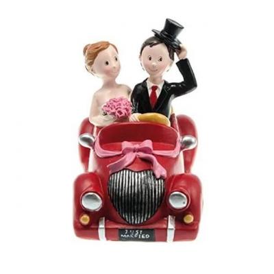 1 Figurine mariage résine couple de mariés en voiture rouge 18 x 10 x 14.5cm REF/80182