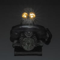 91253010 decoration halloween tete de mort telephone cranium lumineux