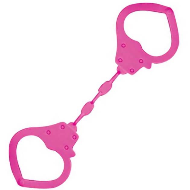 Cadeau de fete avec des menottes coeur rose fuchsia en solicone