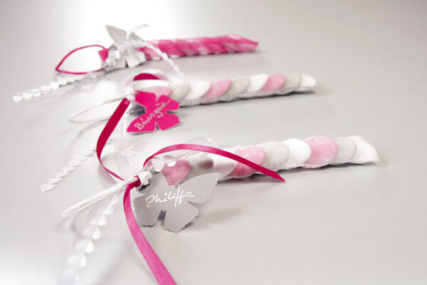 Confection de dragee papillon fuchsia
