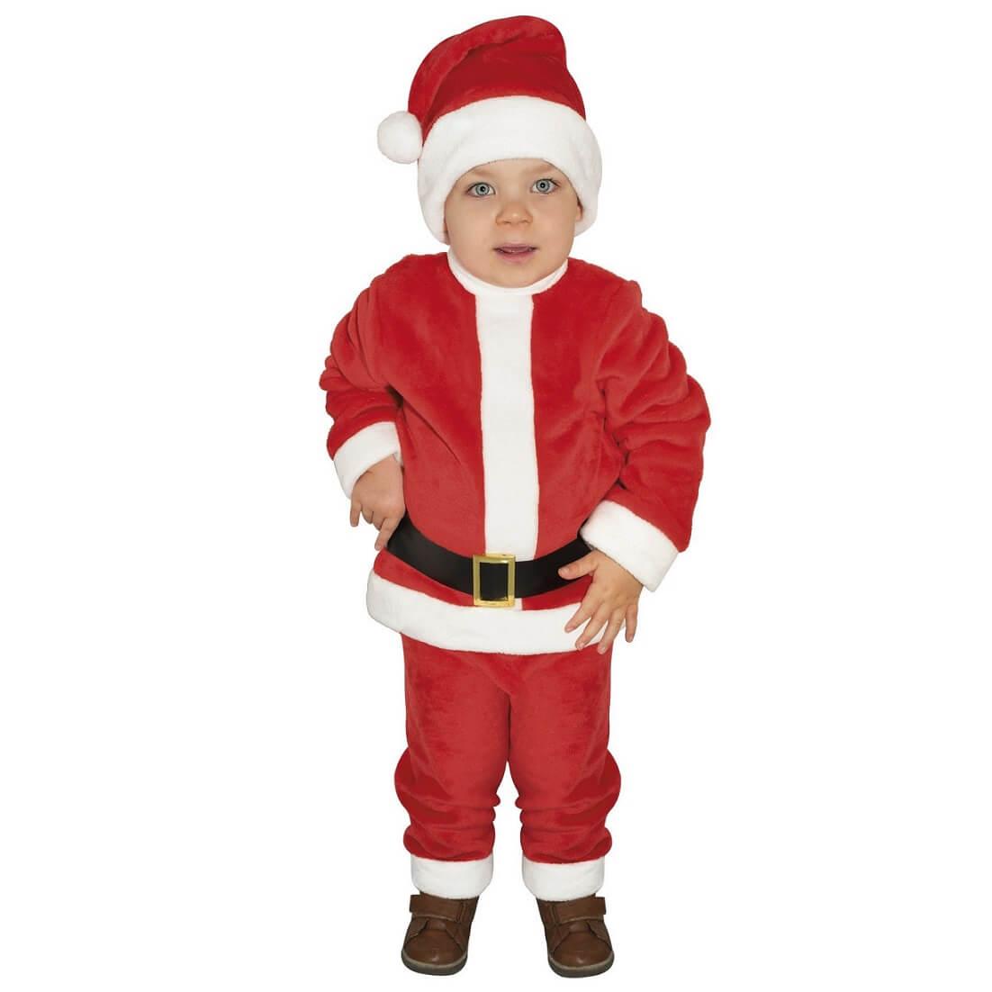 Un Petit Enfant Dans Un Costume De Père Noël Rouge Joue Par Une