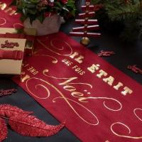 Decoration de table avec feuille de palme rouge sur tige