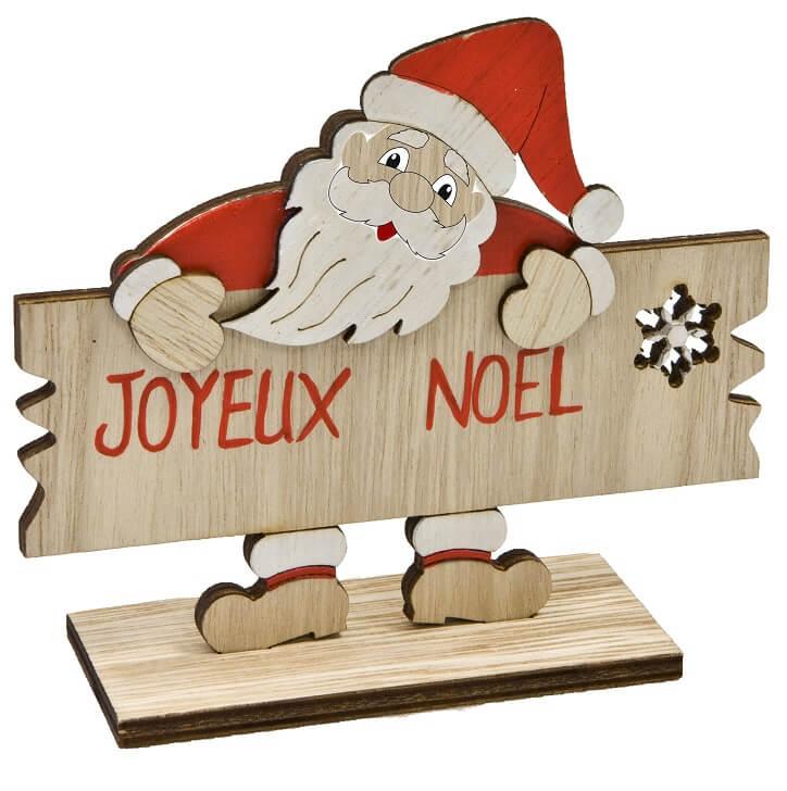 Dek0480 decoration pere noel bois accoude sur pancarte joyeux noel