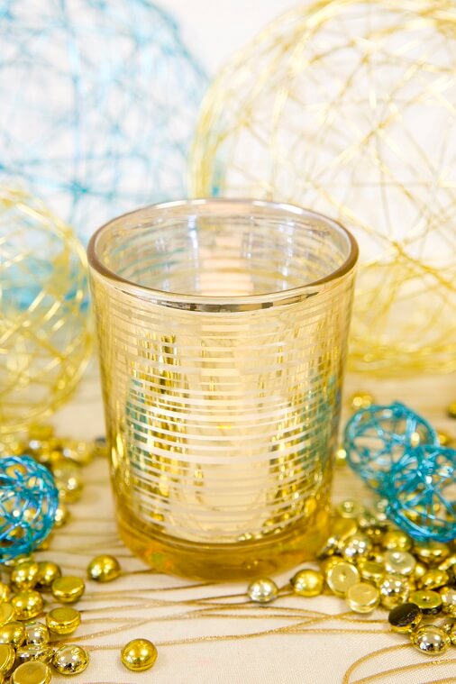 Photophore metallique dore