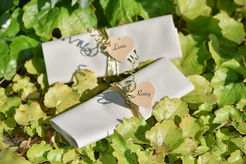 Pliage de serviette avec marque place coeur
