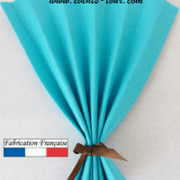 Pliage de serviette eventail bleu turquoise 1