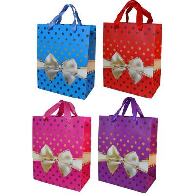 Sac cadeau de noel avec decoration noeud
